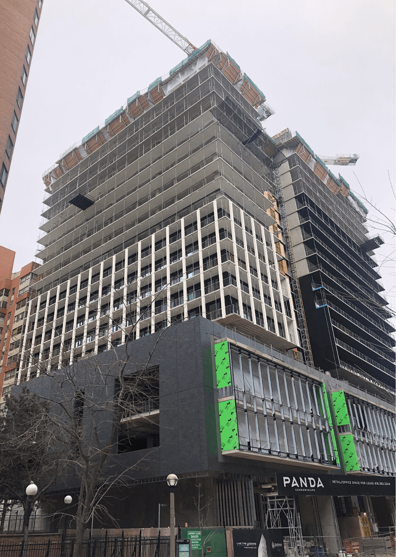 building under construction installing windows